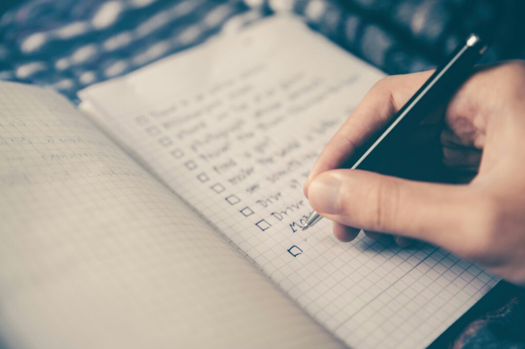 A guy is filling out a checklist.